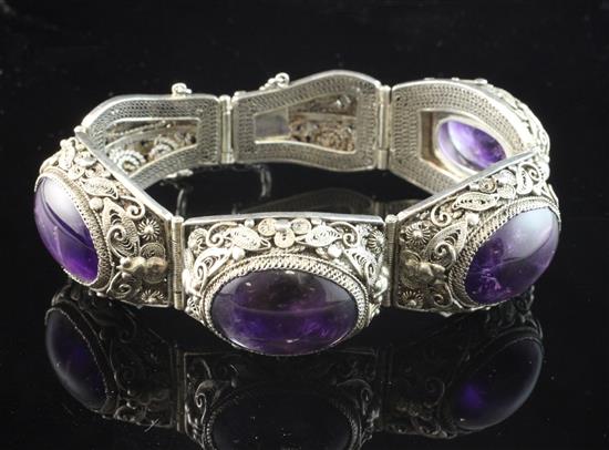 A 20th century Chinese silver filligree and cabochon amethyst bracelet,